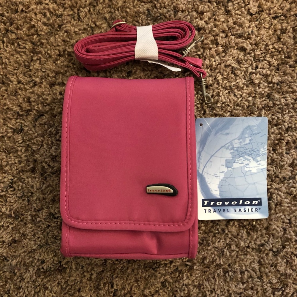 Travelon hot pink crossbody / belt purse